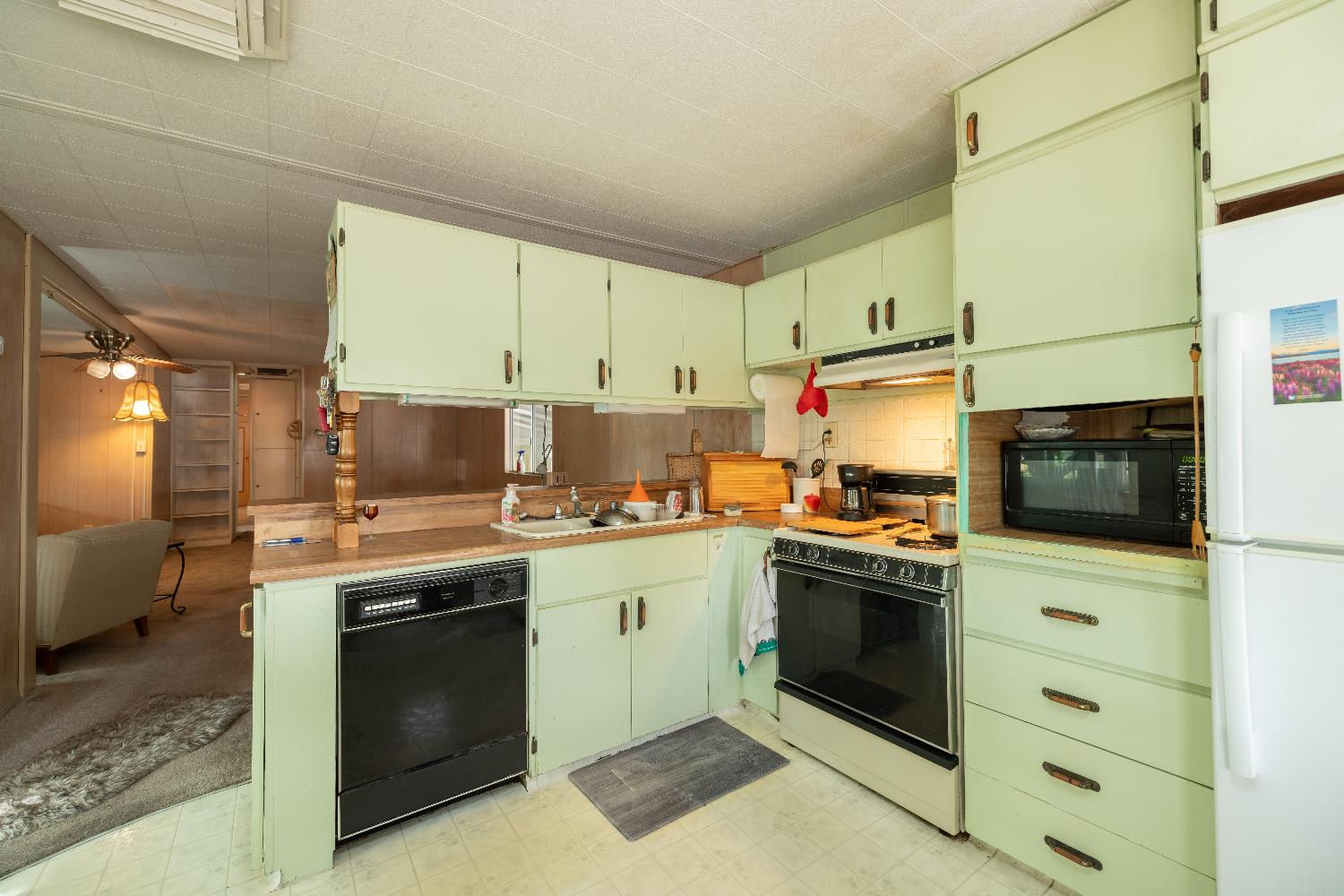 60 Birch Lane Folsom, CA 95630 - Photo 9 of 24 a kitchen with stainless steel appliances a stove sink and microwave