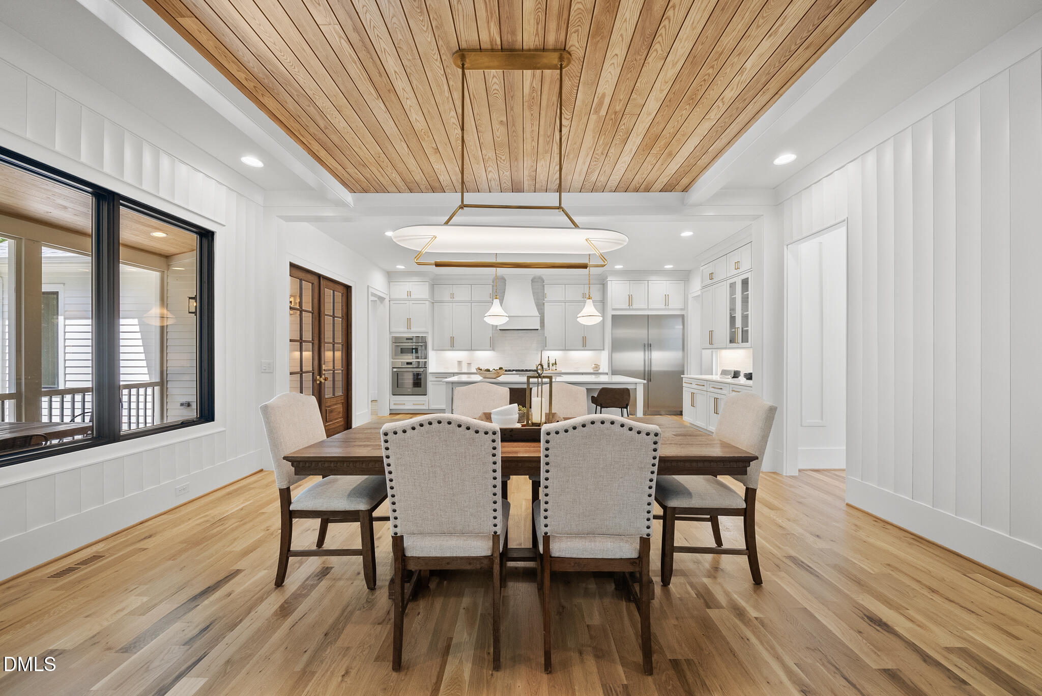 1609 Ridge Road Raleigh, NC 27607 - Photo 9 of 62 a view of a dining room with furniture wooden floor and chandelier