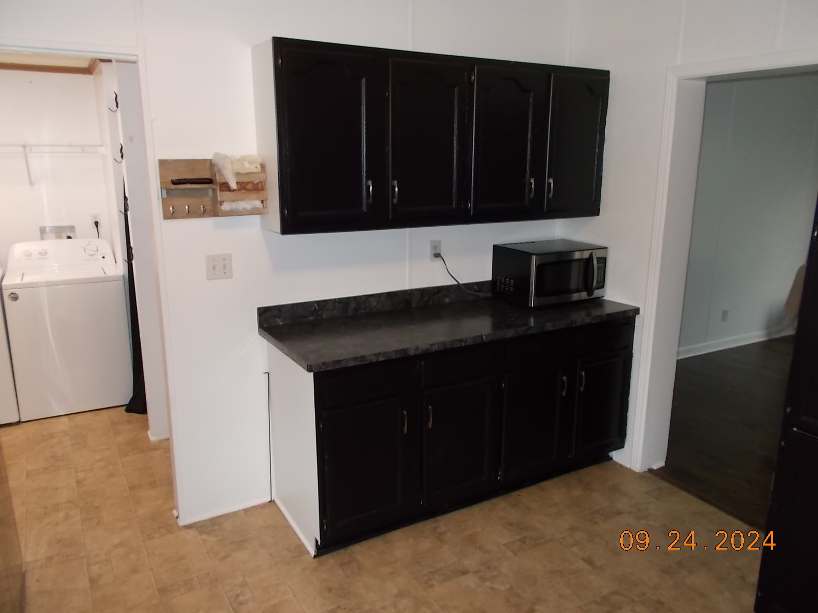 3354 Linwood Road Watertown, TN 37184 - Photo 35 of 54 a kitchen with a refrigerator and cabinets
