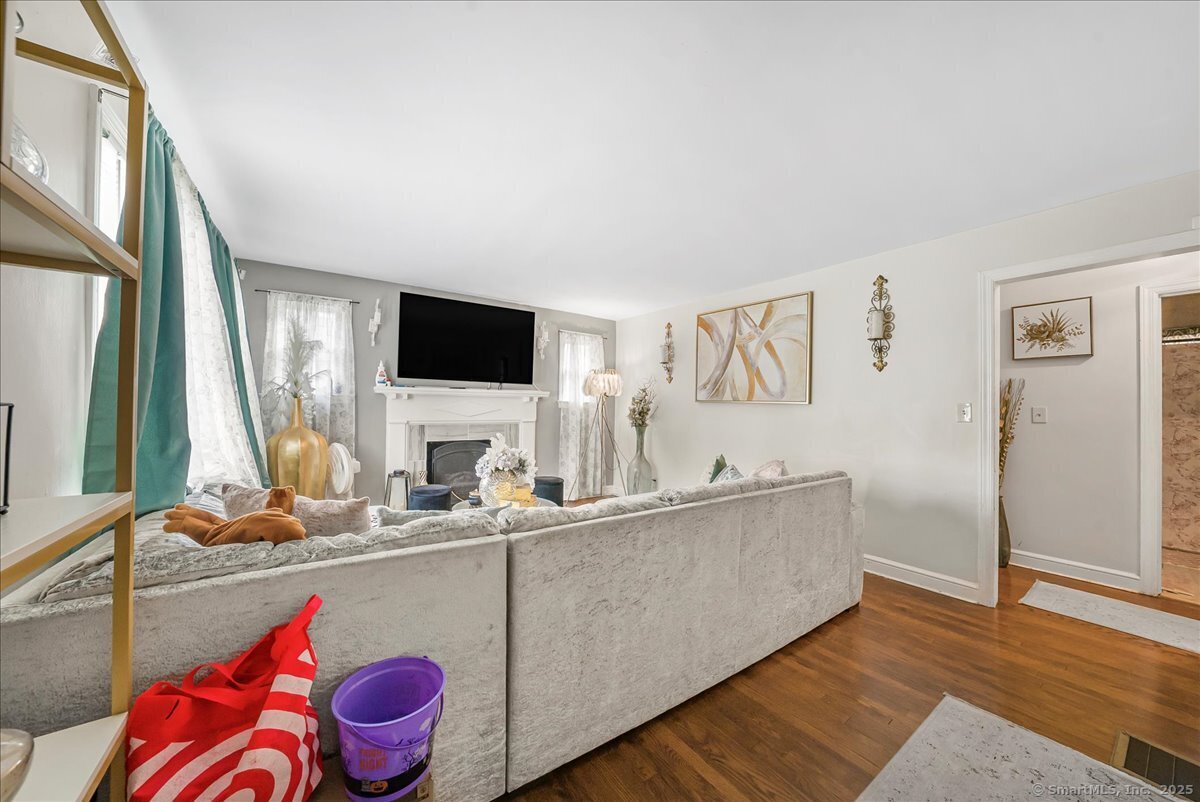 631 Fairview Avenue Bridgeport, CT 06606 - Photo 15 of 22 a living room with furniture and a flat screen tv