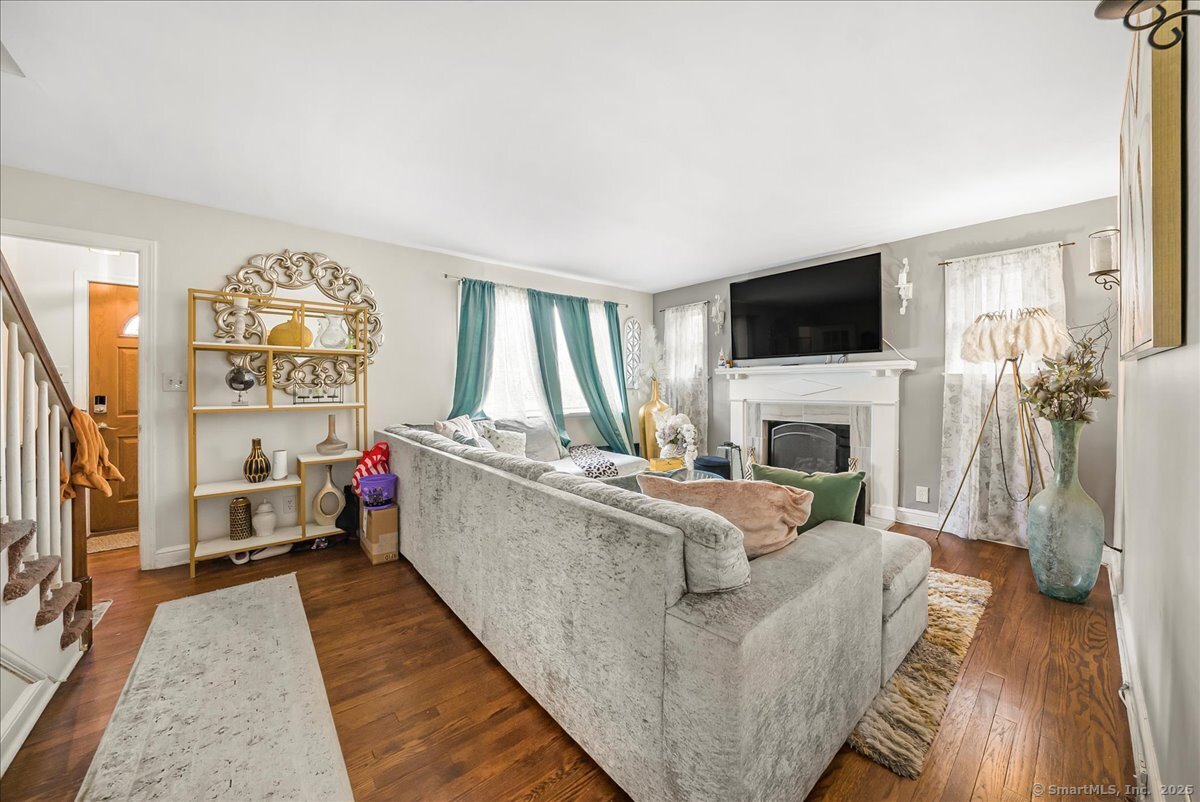 631 Fairview Avenue Bridgeport, CT 06606 - Photo 10 of 22 a living room with furniture fireplace and flat screen tv