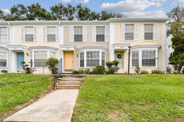 front view of a house with a yard