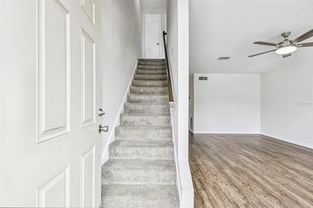 a view of an entryway with staircase