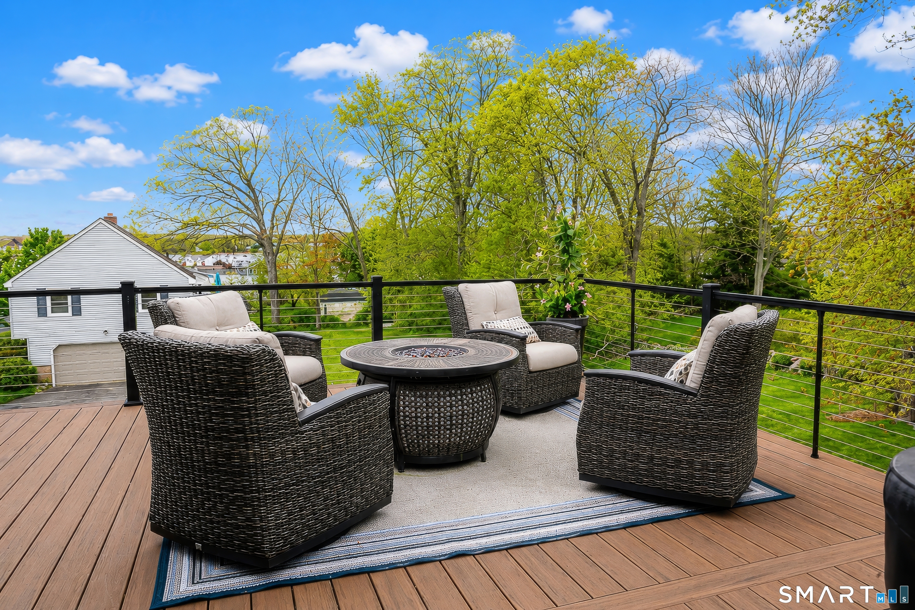 8 East Wharf Road Waterford, CT 06385 - Photo 10 of 40 a view of a patio with couches chairs and a potted plant