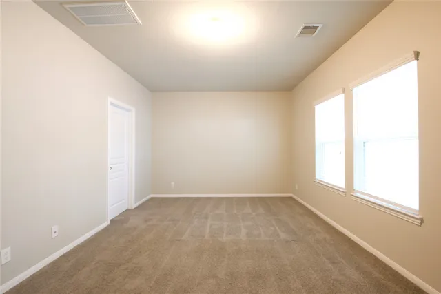 an empty room with a window