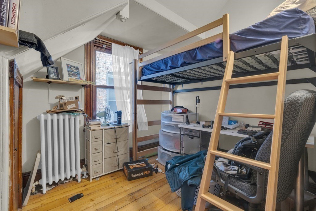 100 Calumet Street Boston, MA 02120 - Photo 18 of 42 a room with furniture and a window