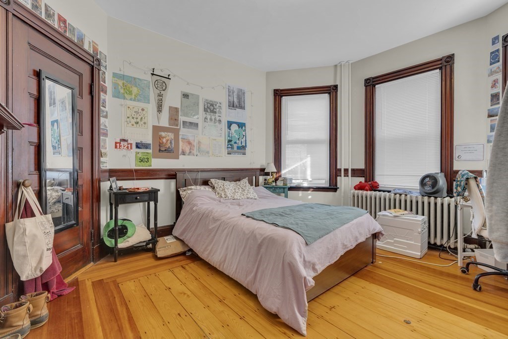 100 Calumet Street Boston, MA 02120 - Photo 23 of 42 a bedroom with a bed and a window