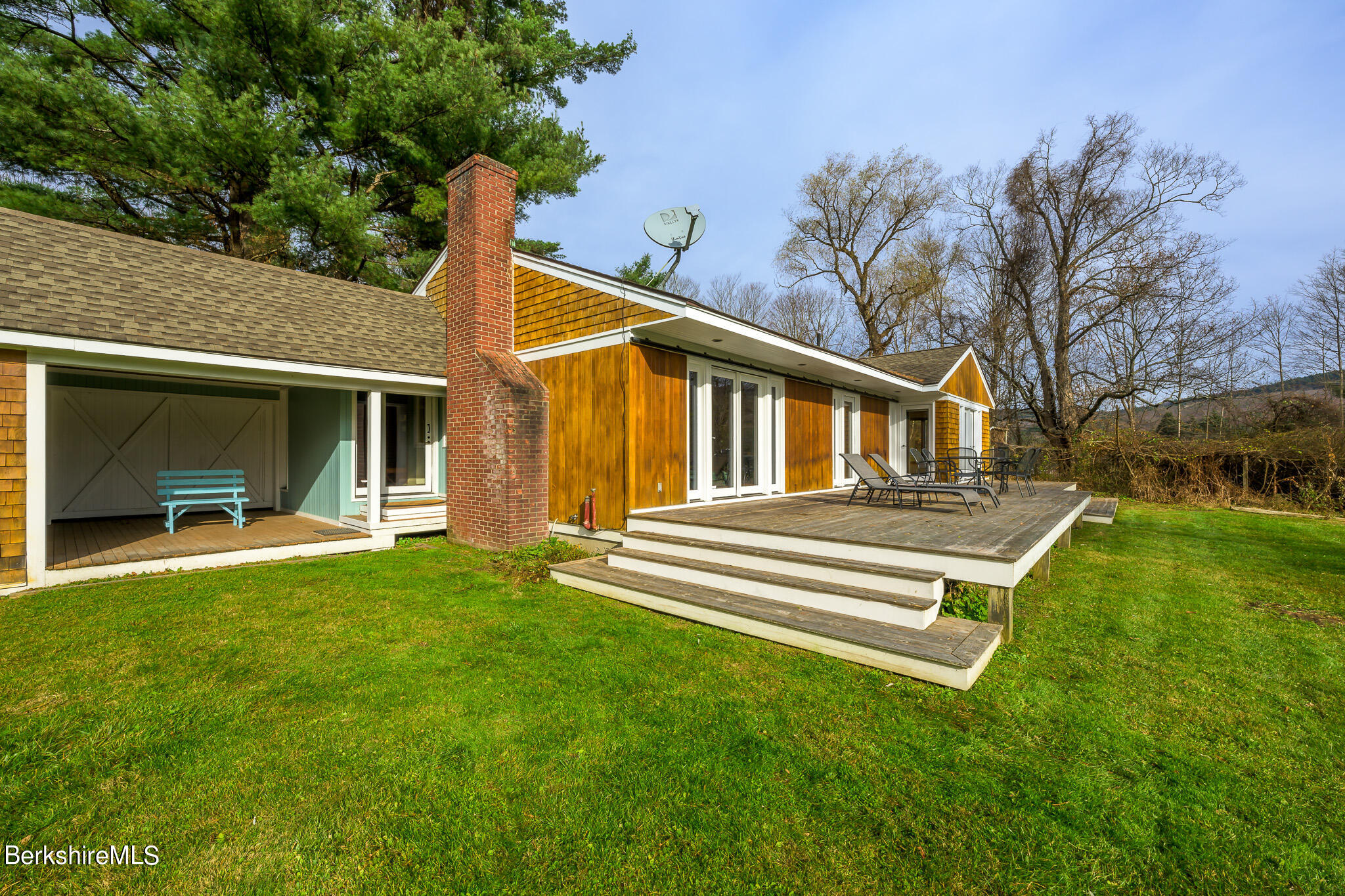 1 Furnace Road West Stockbridge, MA 01266 - Photo 8 of 36 a front view of a house with a garden and yard
