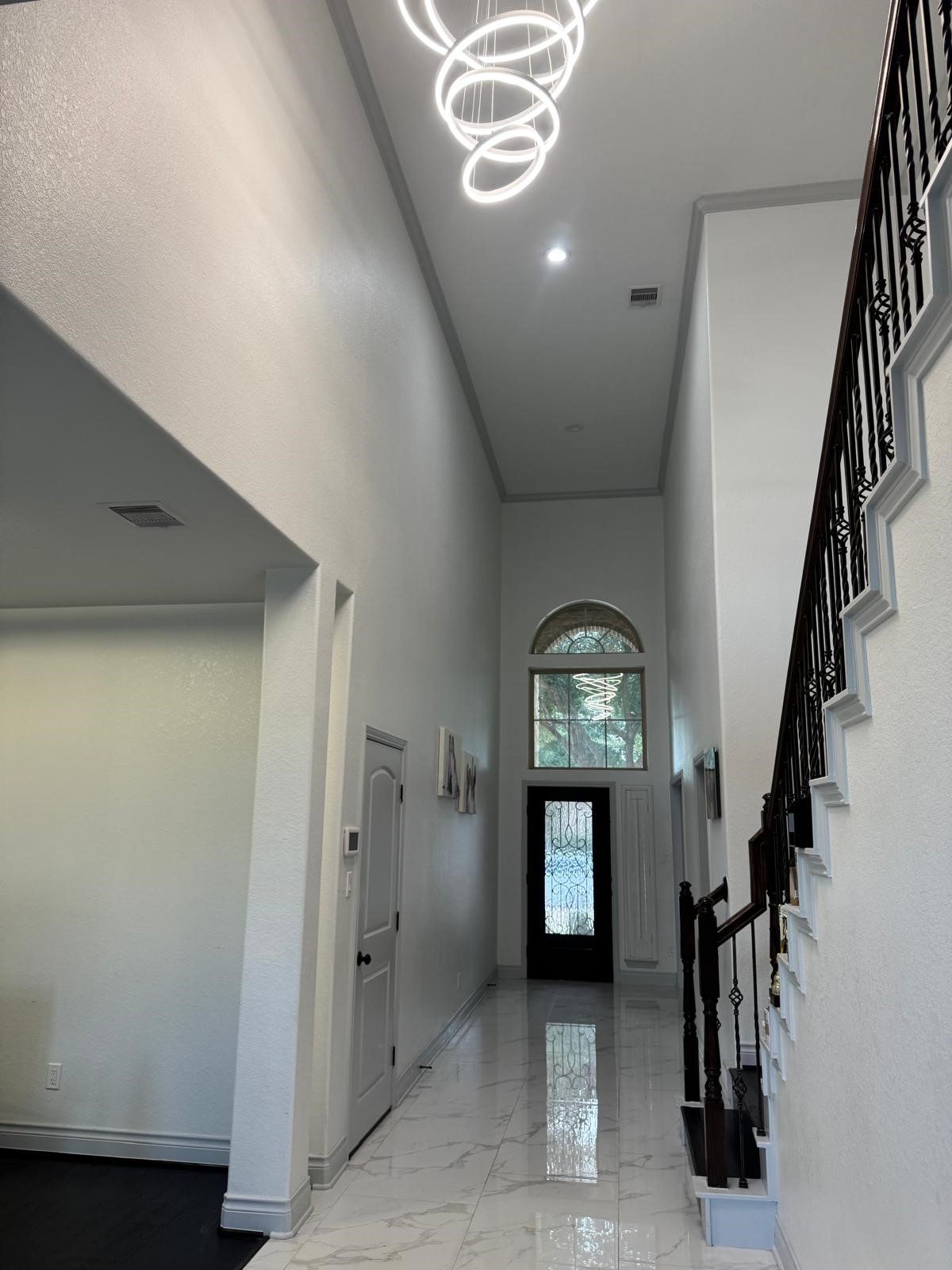5003 Raudabaugh Drive Katy, TX 77494 - Photo 12 of 36 a view of a hallway with wooden floor and entryway