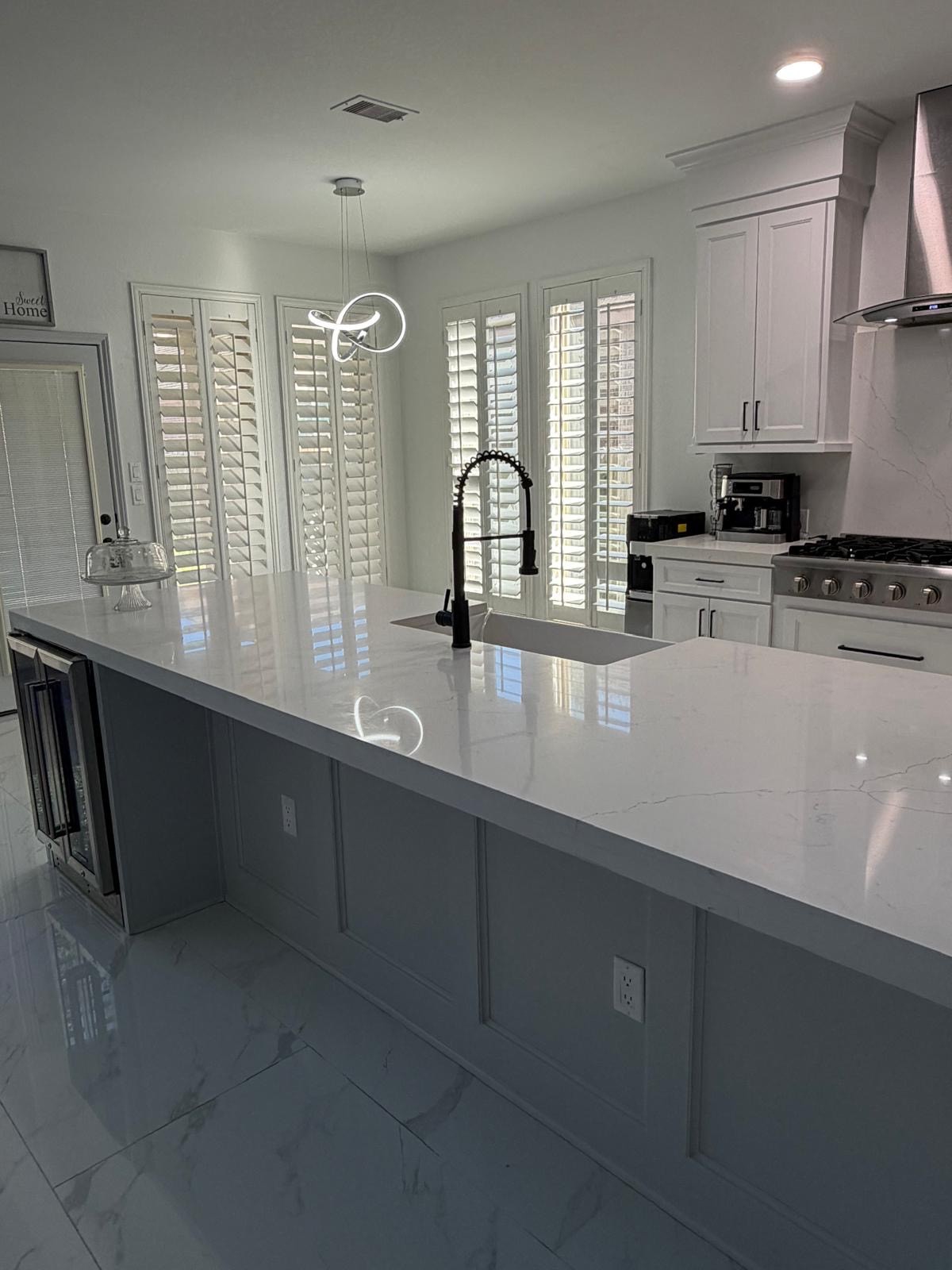 5003 Raudabaugh Drive Katy, TX 77494 - Photo 14 of 36 a kitchen with stainless steel appliances granite countertop a sink a stove and cabinets