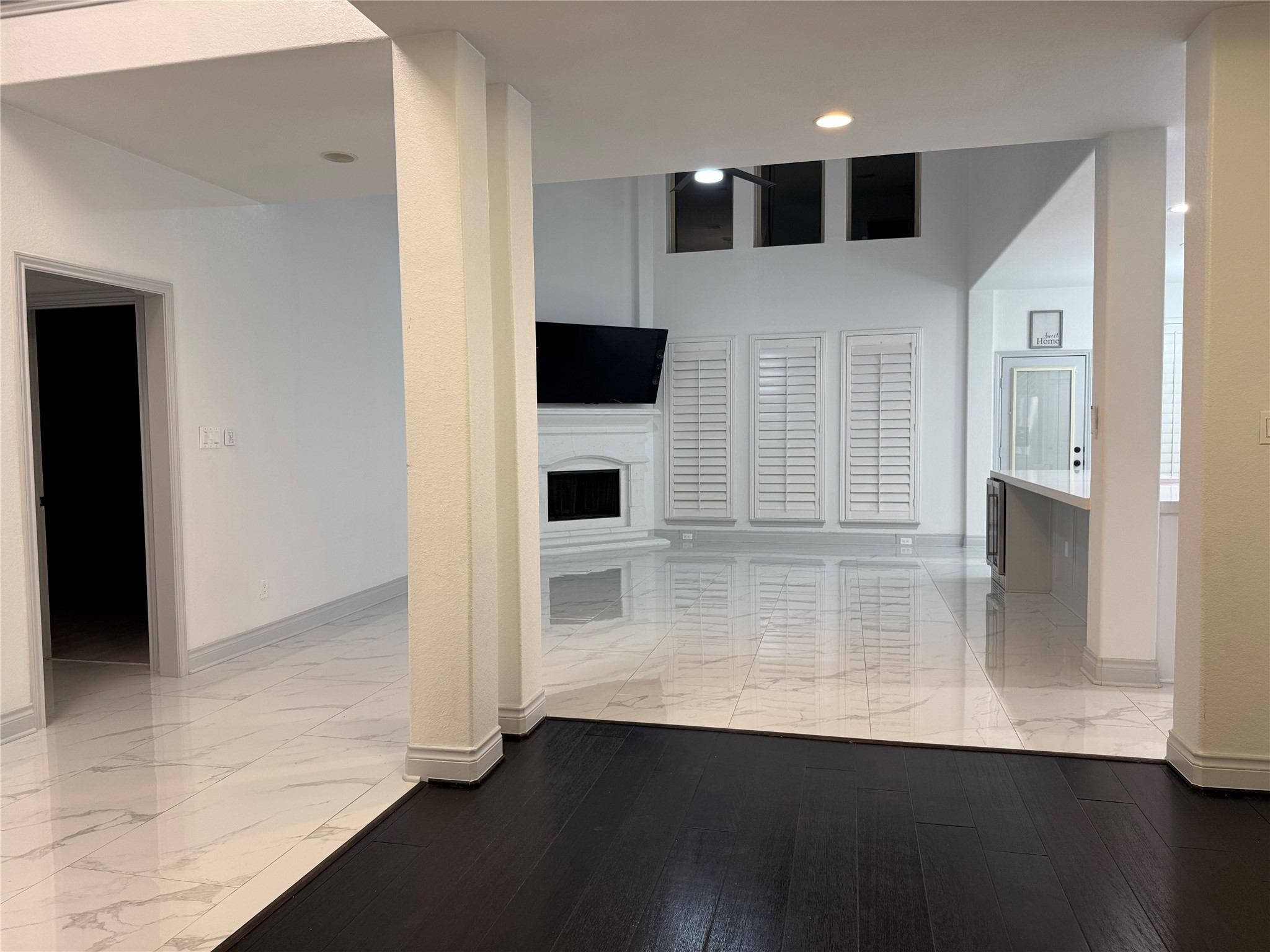 5003 Raudabaugh Drive Katy, TX 77494 - Photo 17 of 36 an empty room with wooden floor and windows