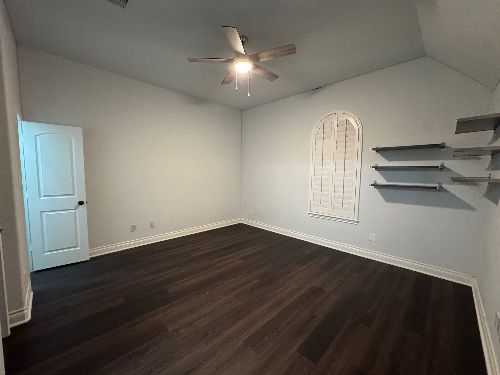 5003 Raudabaugh Drive Katy, TX 77494 - Photo 24 of 36 a view of empty room with wooden floor and fan
