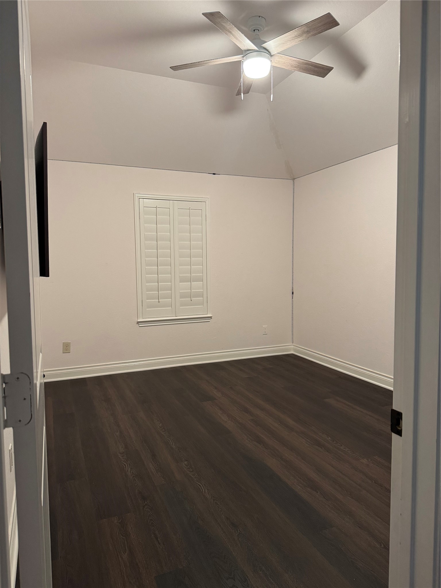 5003 Raudabaugh Drive Katy, TX 77494 - Photo 28 of 36 an empty room with wooden floor and fan