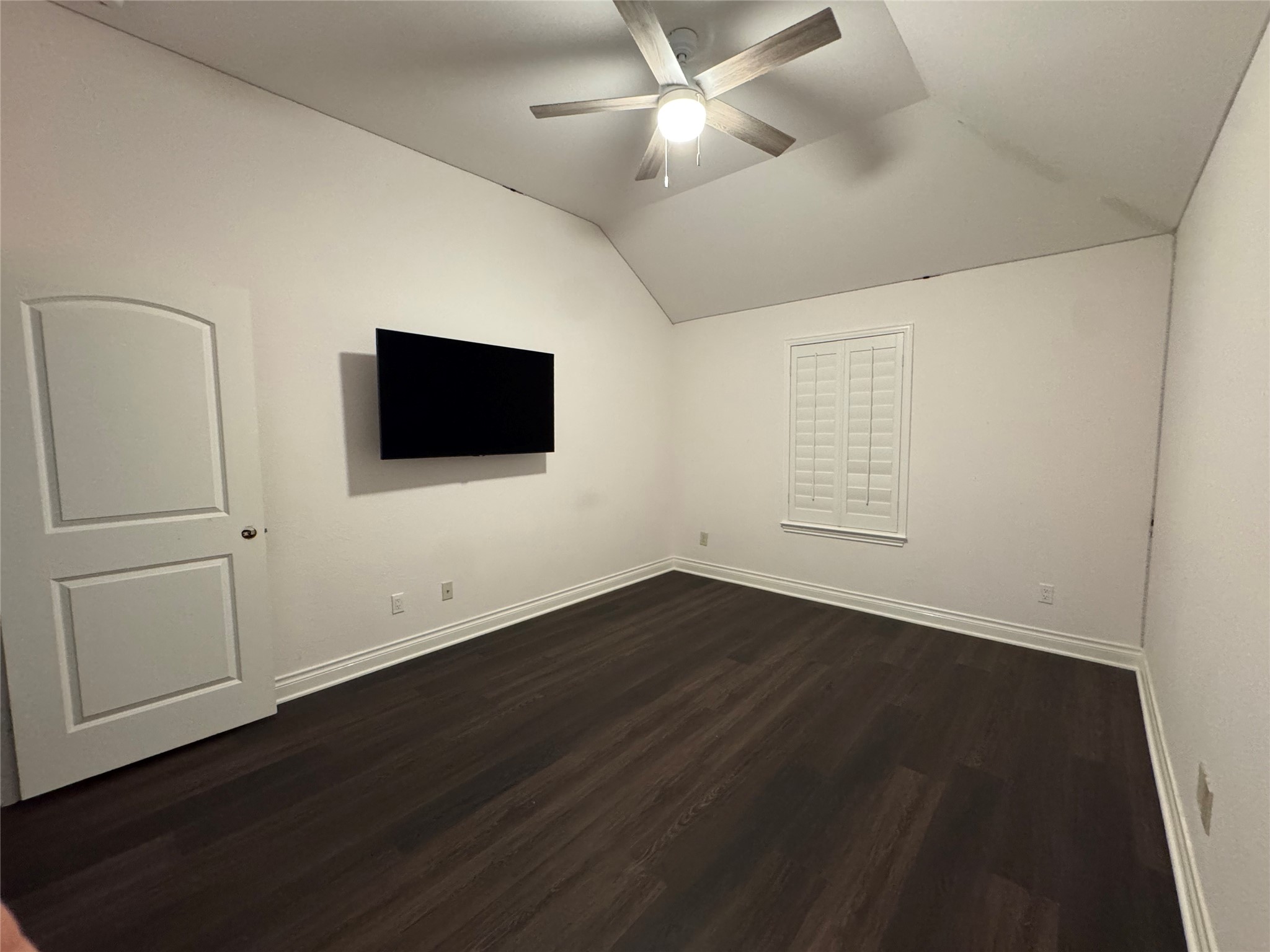 5003 Raudabaugh Drive Katy, TX 77494 - Photo 29 of 36 an empty room with wooden floor and windows