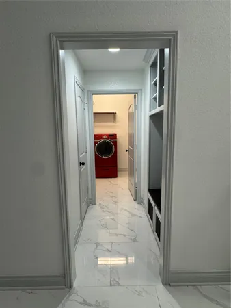 a view of an empty walk in closet