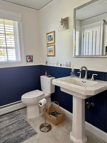 a bathroom with a sink and a toilet