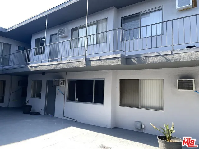 a kitchen with kitchen island granite countertop a oven