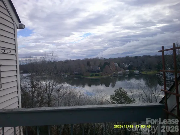 a view of a lake from a balcony