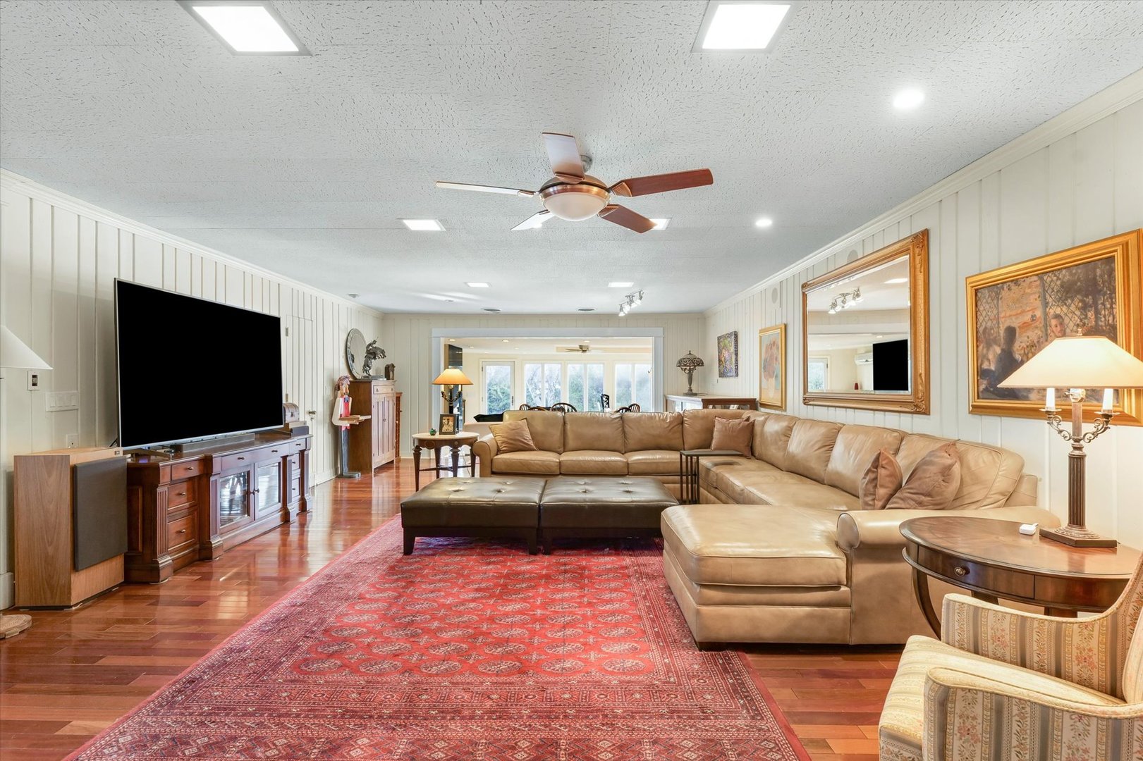 22 Greencroft Drive Champaign, IL 61821 - Photo 36 of 90 a living room with furniture and a flat screen tv