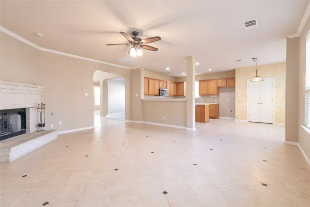 a view of a livingroom with a kitchen