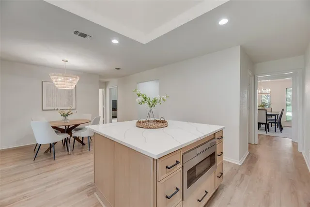 a view of kitchen island with breakfast area