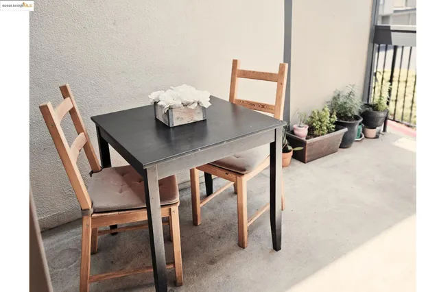 a bathroom with a toilet sink vanity and mirror