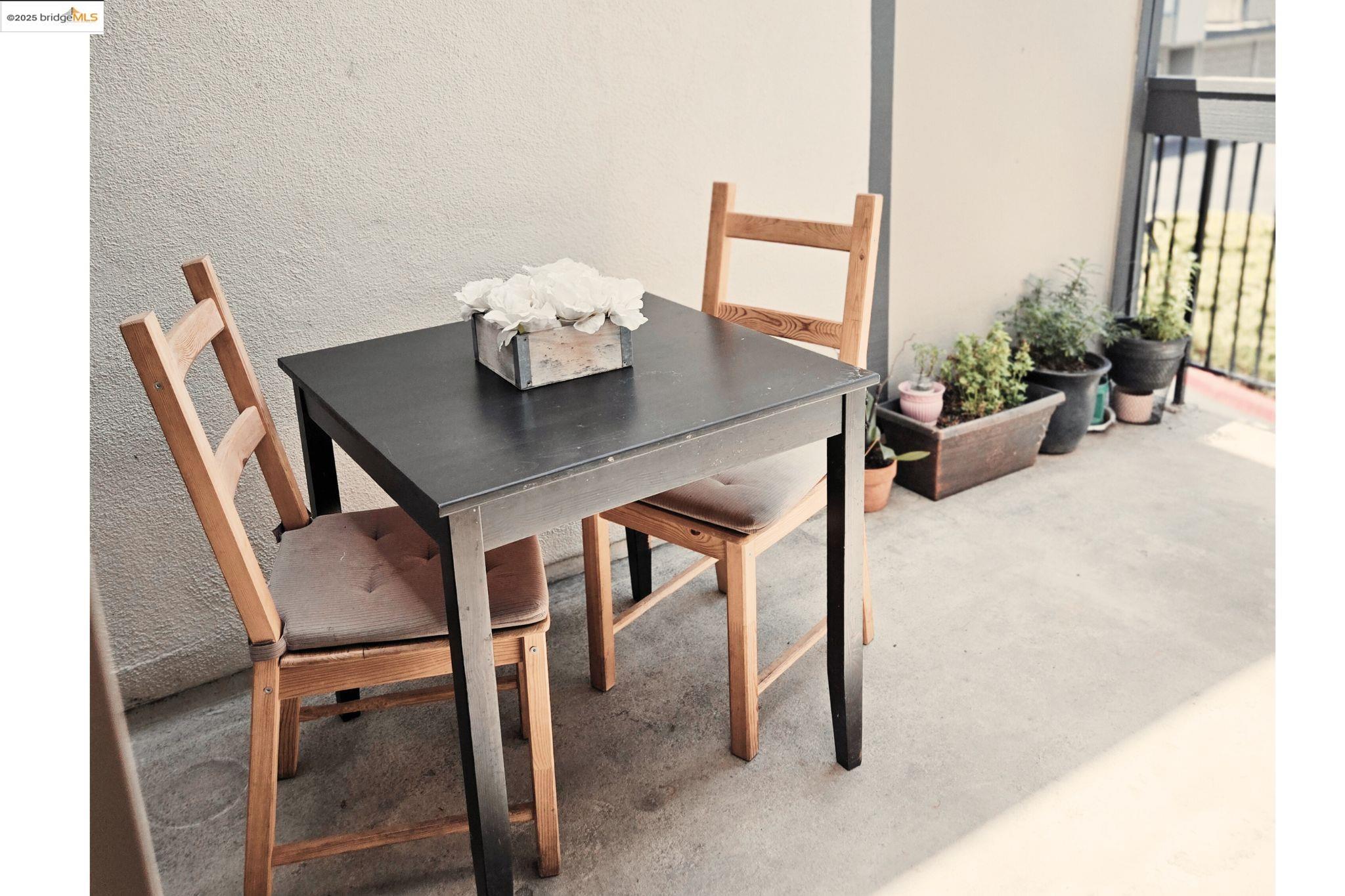 2036 Sierra Road, Unit 2 Concord, CA 94518 - Photo 13 of 32 a view of a dining room with furniture and a potted plant