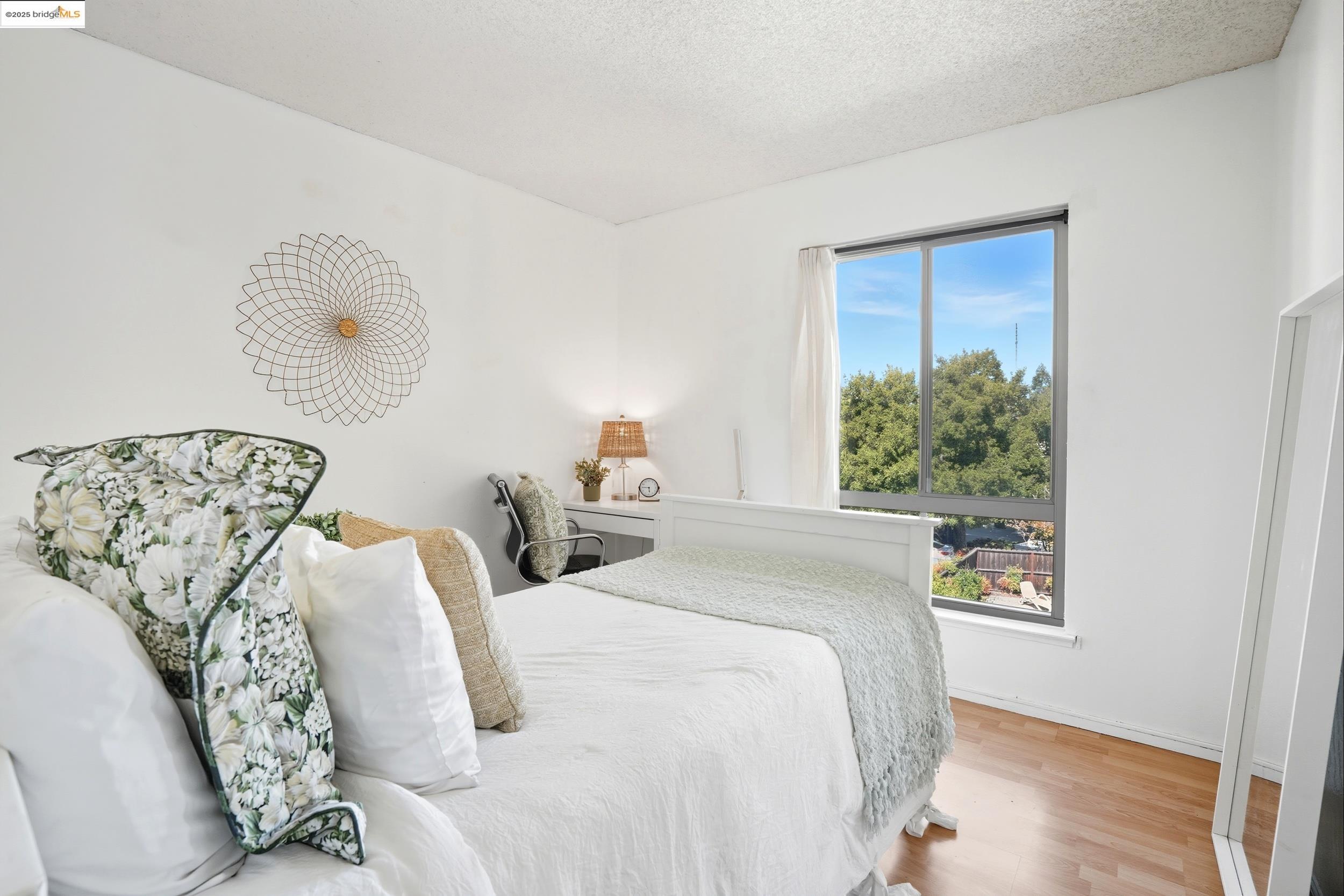 2036 Sierra Road, Unit 2 Concord, CA 94518 - Photo 17 of 32 a bedroom with a large bed and a window