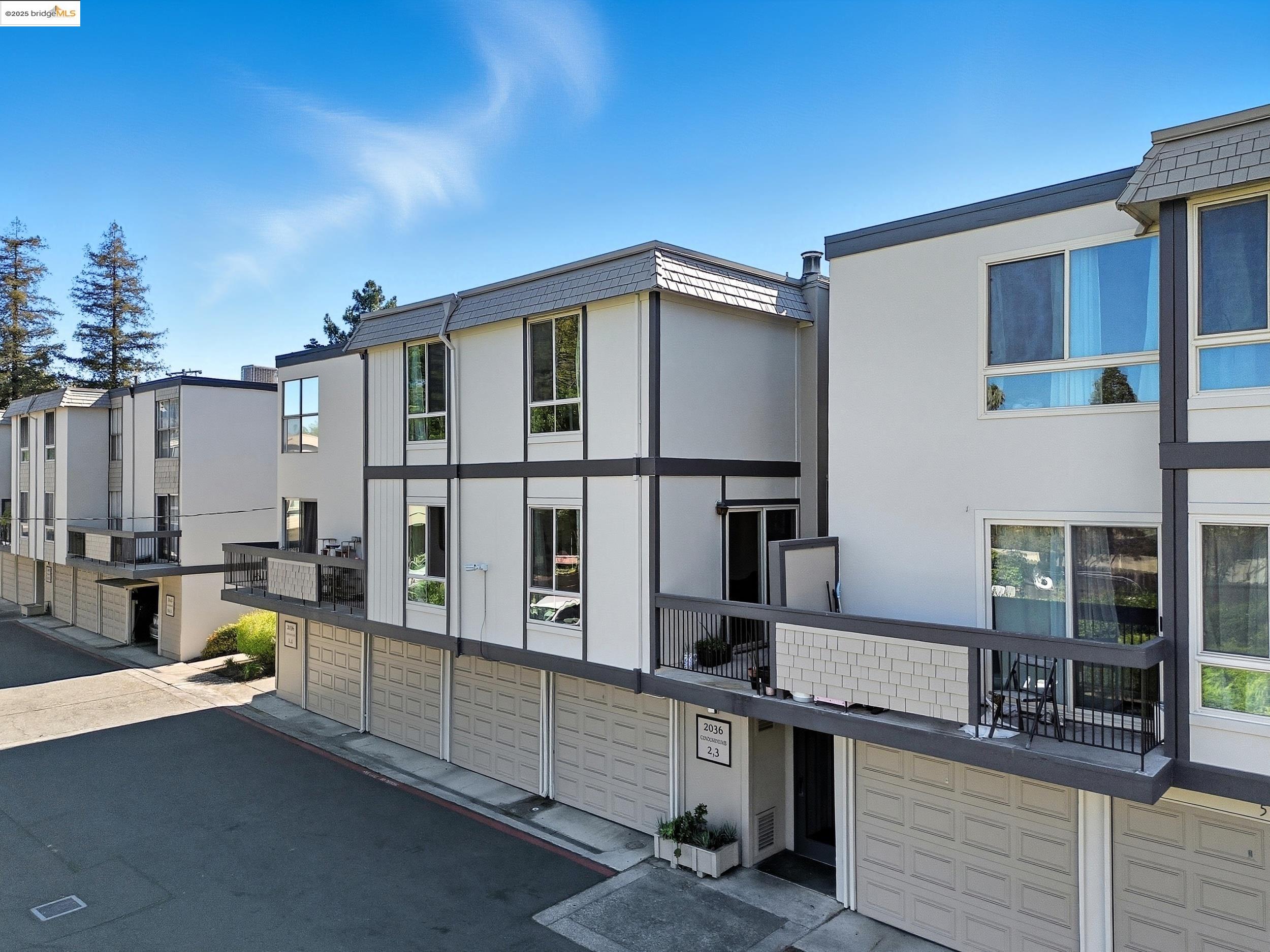 2036 Sierra Road, Unit 2 Concord, CA 94518 - Photo 29 of 32 View of property exterior with stucco siding and an attached garage