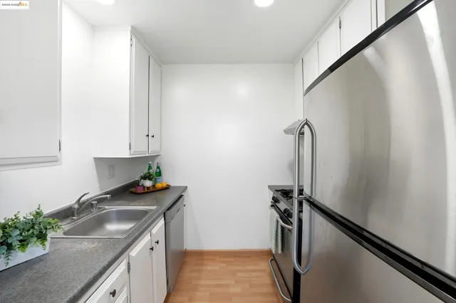 a bedroom with a bed and a chair