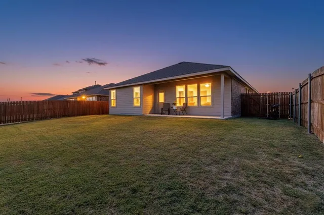 a front view of house with yard