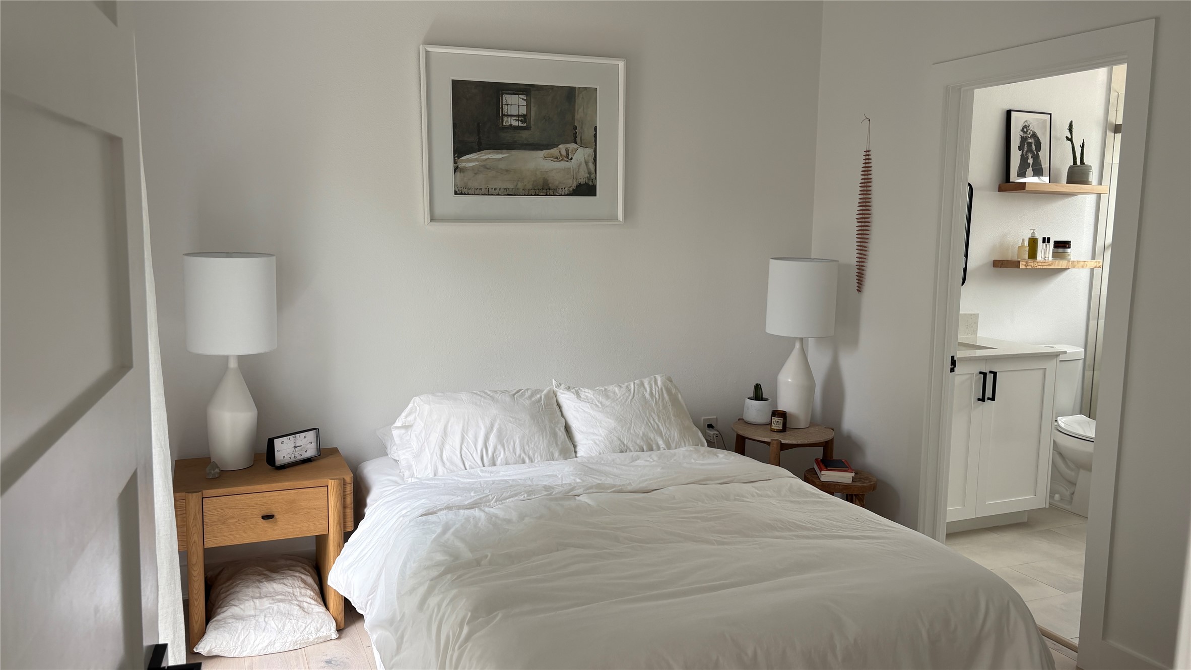 1816 Adina Street, Unit 2 Austin, TX 78721 - Photo 12 of 25 Bedroom featuring light wood-finish flooring and a neutral color palette
