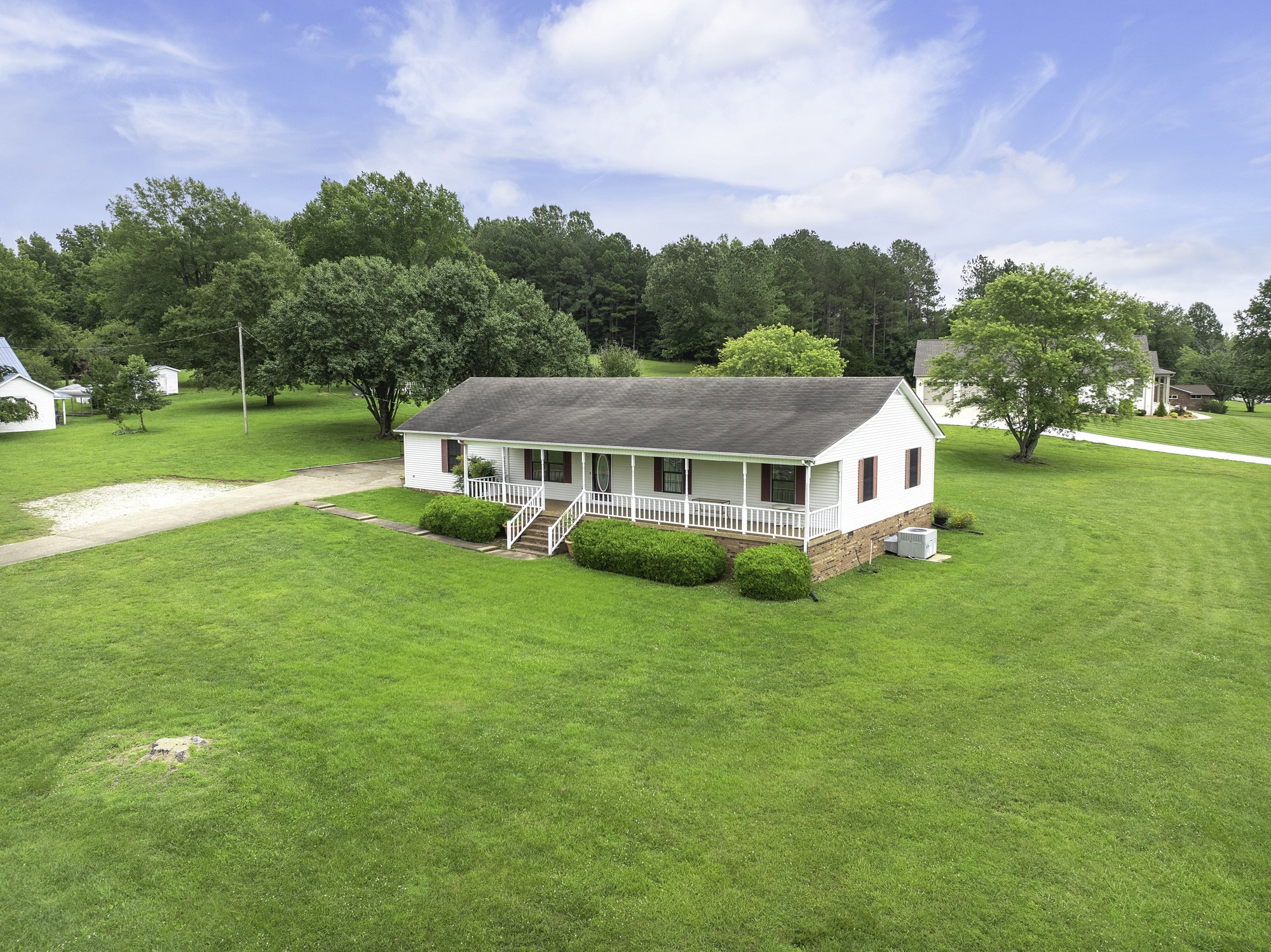 a view of a house with a big yard