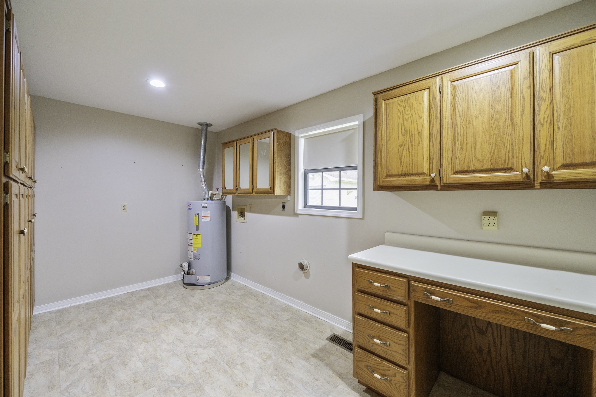 17930 West Main Street Huntingdon, TN 38344 - Photo 12 of 28 a kitchen with stainless steel appliances granite countertop a sink and cabinets with wooden floor