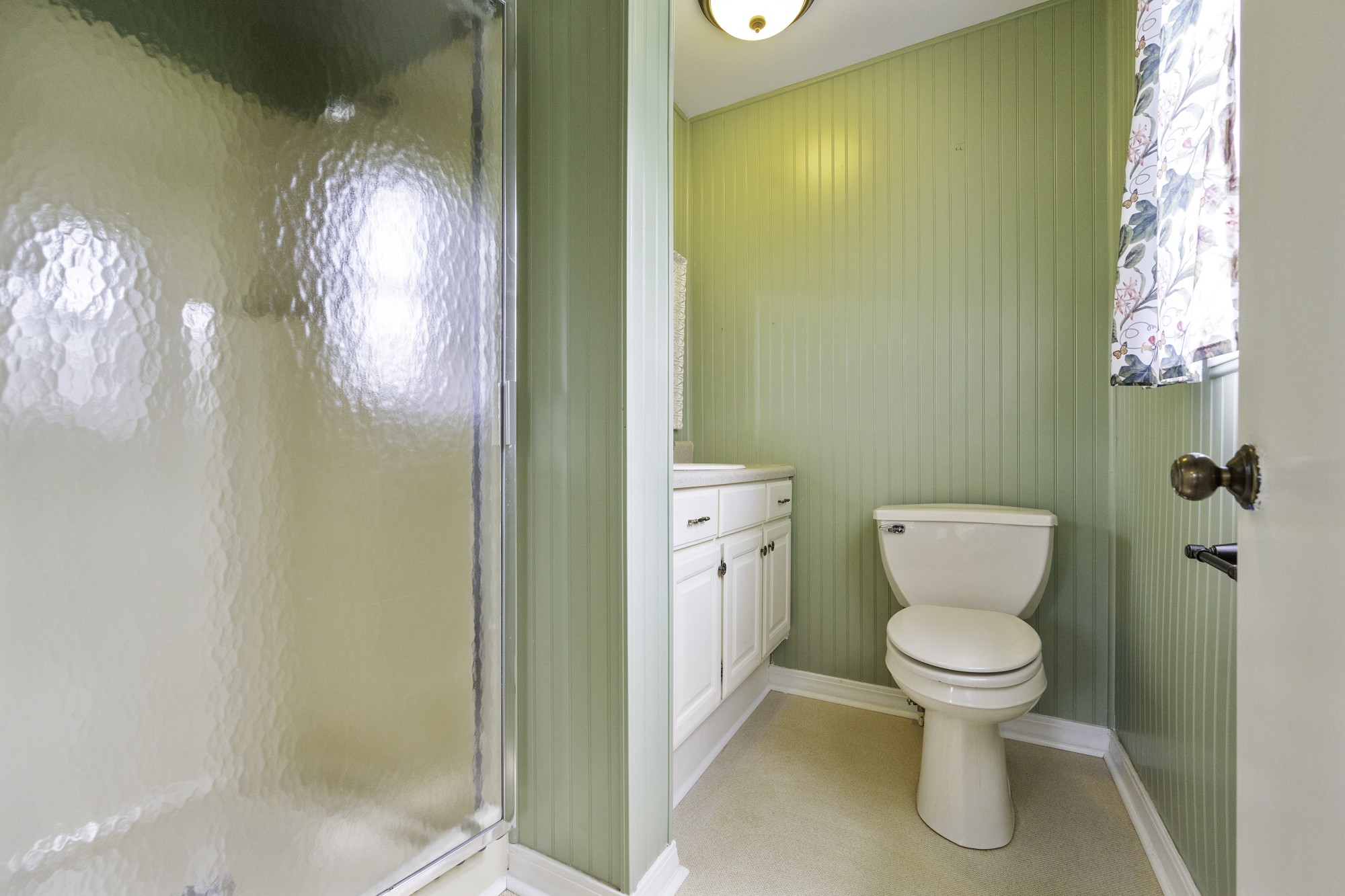 17930 West Main Street Huntingdon, TN 38344 - Photo 20 of 28 a white toilet sitting next to a bathroom sink