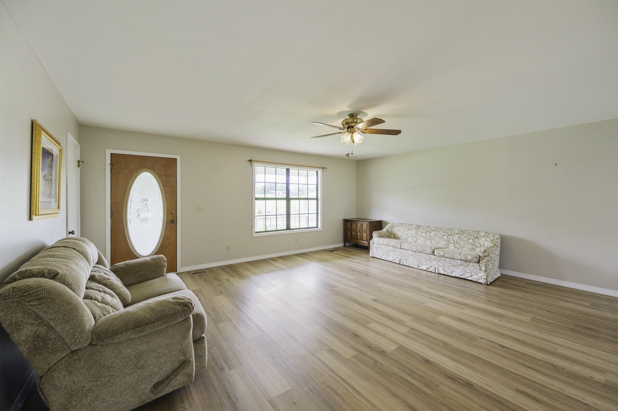 17930 West Main Street Huntingdon, TN 38344 - Photo 4 of 28 a living room with furniture and wooden floor