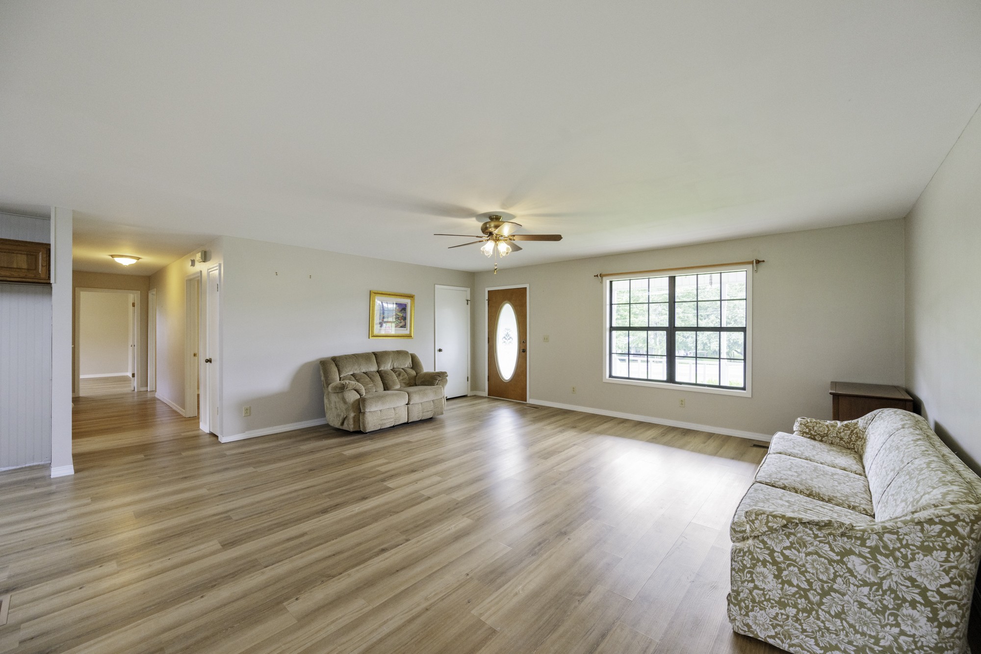 17930 West Main Street Huntingdon, TN 38344 - Photo 5 of 28 a view of a livingroom with furniture and wooden floor