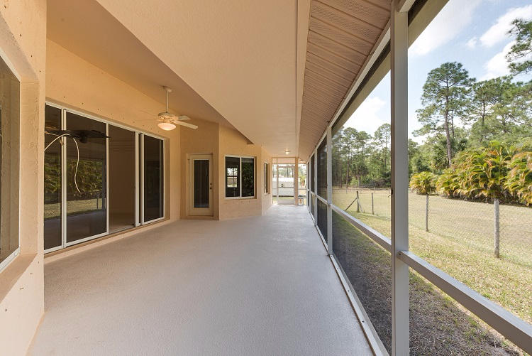 15249 76th Road North Loxahatchee, FL 33470 - Photo 21 of 28 Screened Entertainment Area