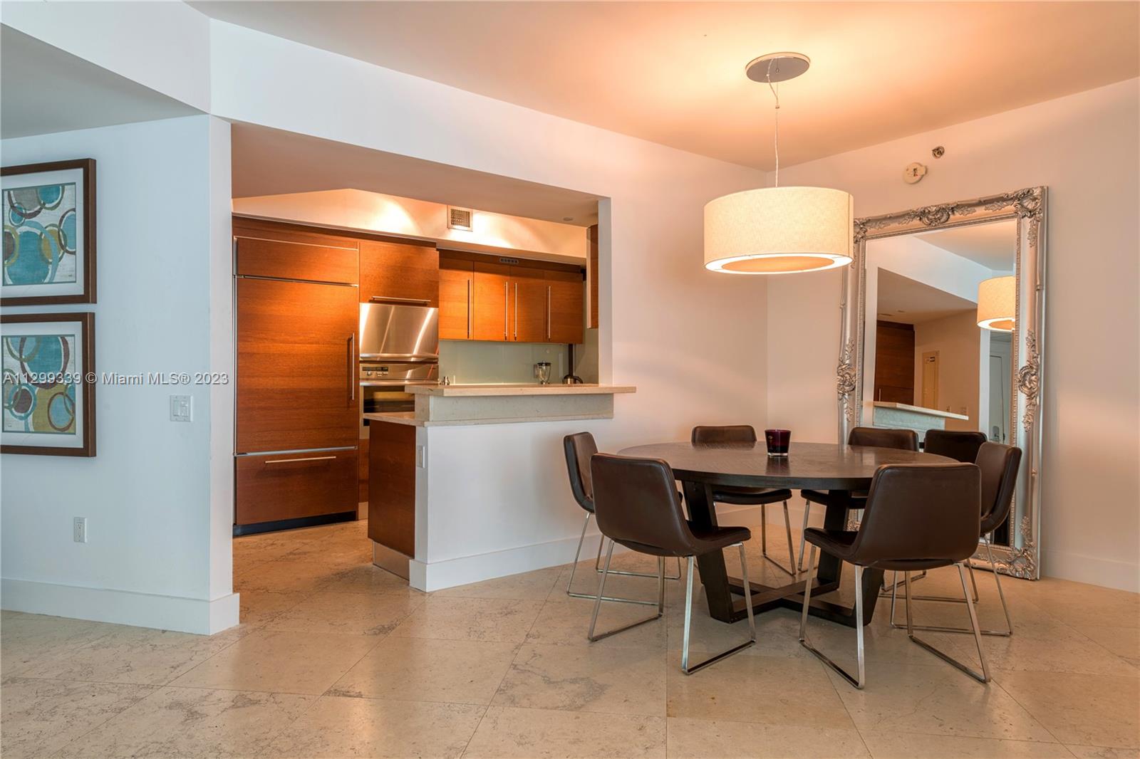 450 Alton Road, Unit 3603 Miami Beach, FL 33139 - Photo 7 of 25 a view of a dining room with furniture