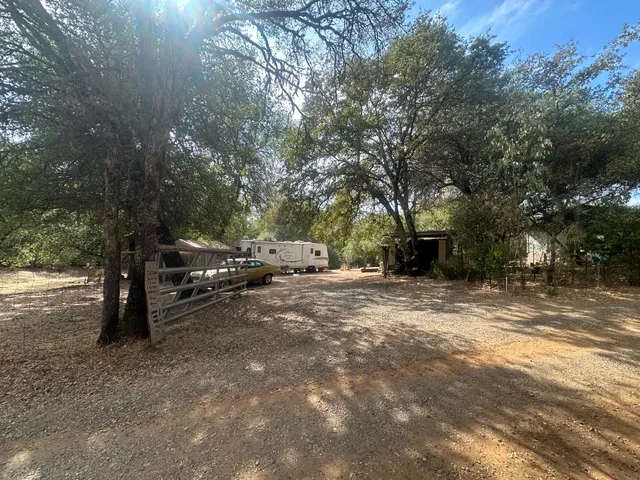 a view of road with trees