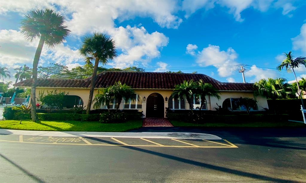 Northeast Boca Raton Boca Raton, FL 33431 - Photo 29 of 32 a front view of a house with a garden