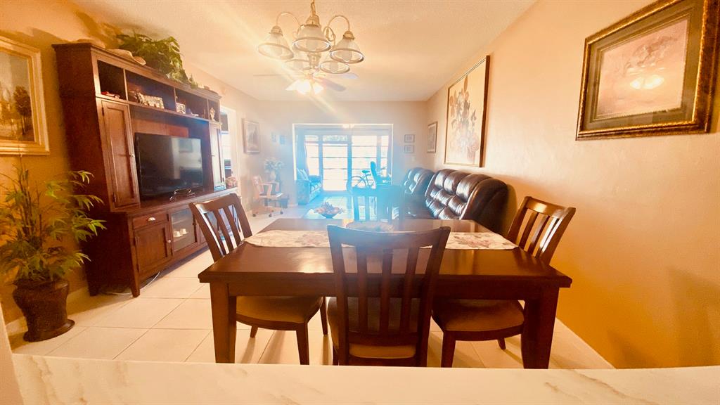 Northeast Boca Raton Boca Raton, FL 33431 - Photo 6 of 32 a view of a dining room with furniture window and outside view