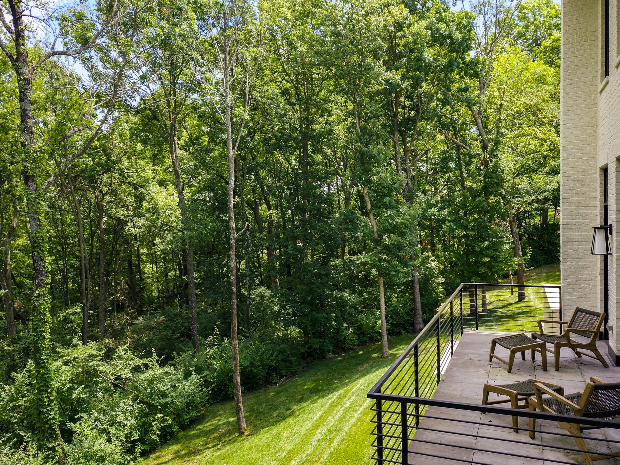 960 Overton Lea Road Nashville, TN 37220 - Photo 18 of 50 a view of a wooden deck and a yard with swimming pool