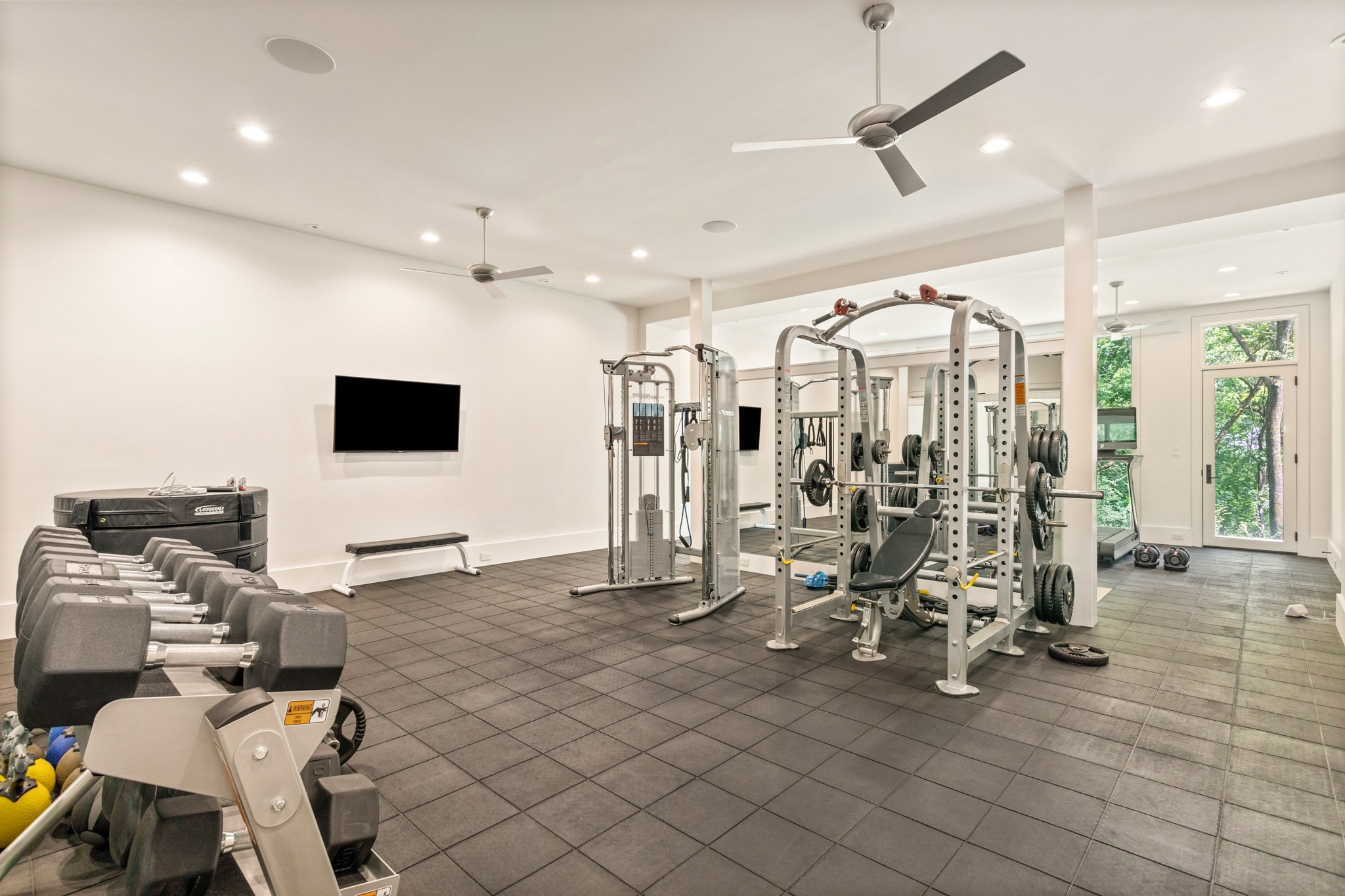960 Overton Lea Road Nashville, TN 37220 - Photo 30 of 50 a view of a room with gym equipment
