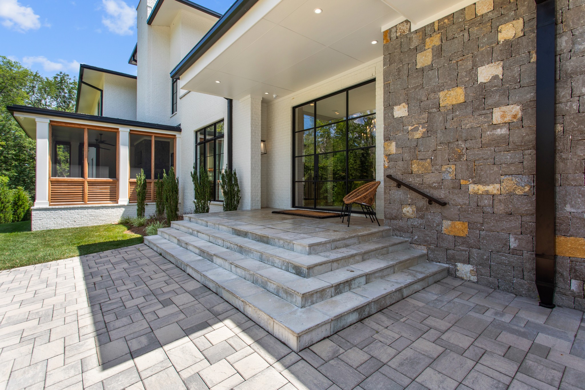 960 Overton Lea Road Nashville, TN 37220 - Photo 3 of 50 a view of a building with a porch