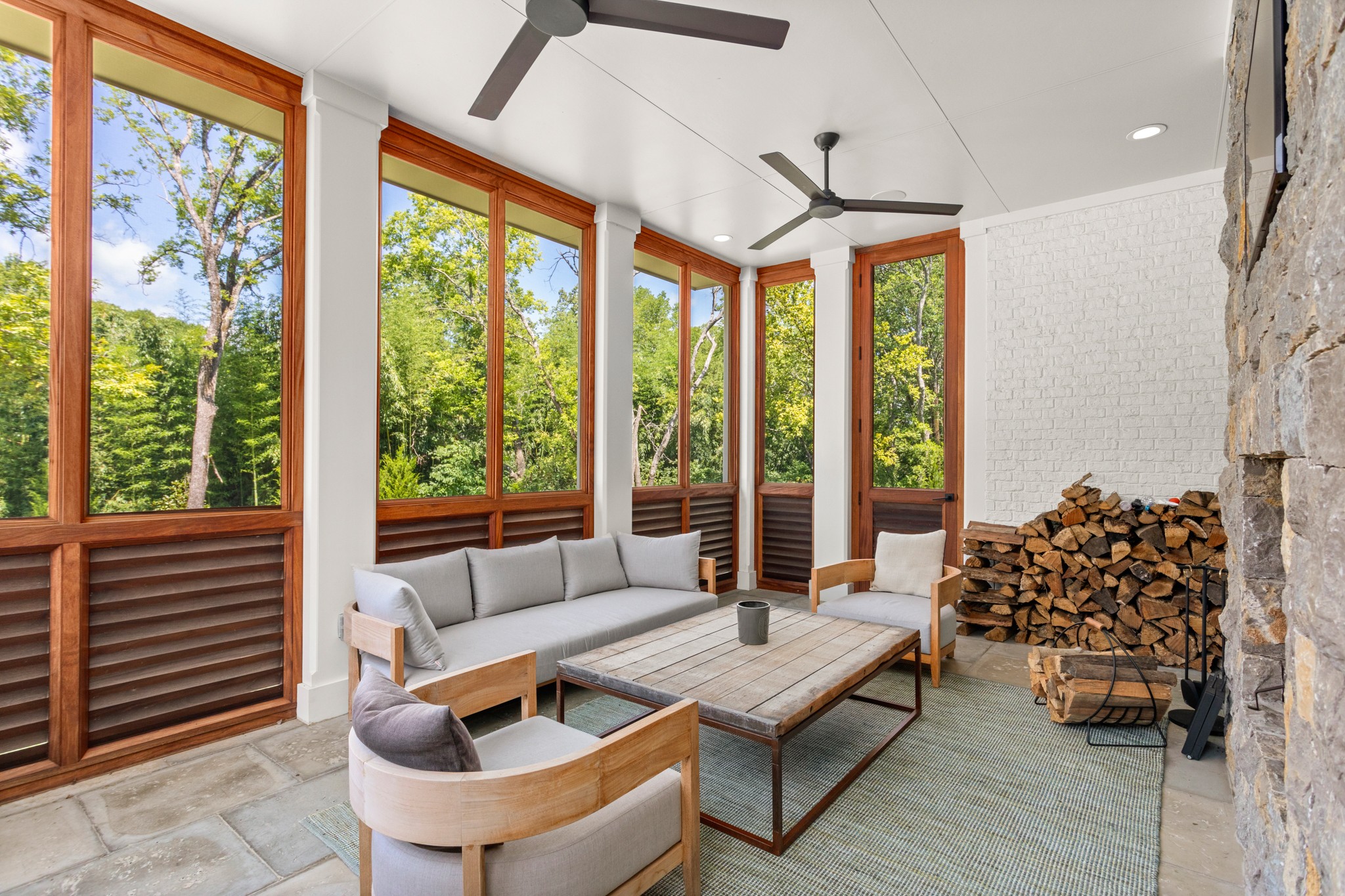 960 Overton Lea Road Nashville, TN 37220 - Photo 35 of 50 a living room with furniture and a floor to ceiling window