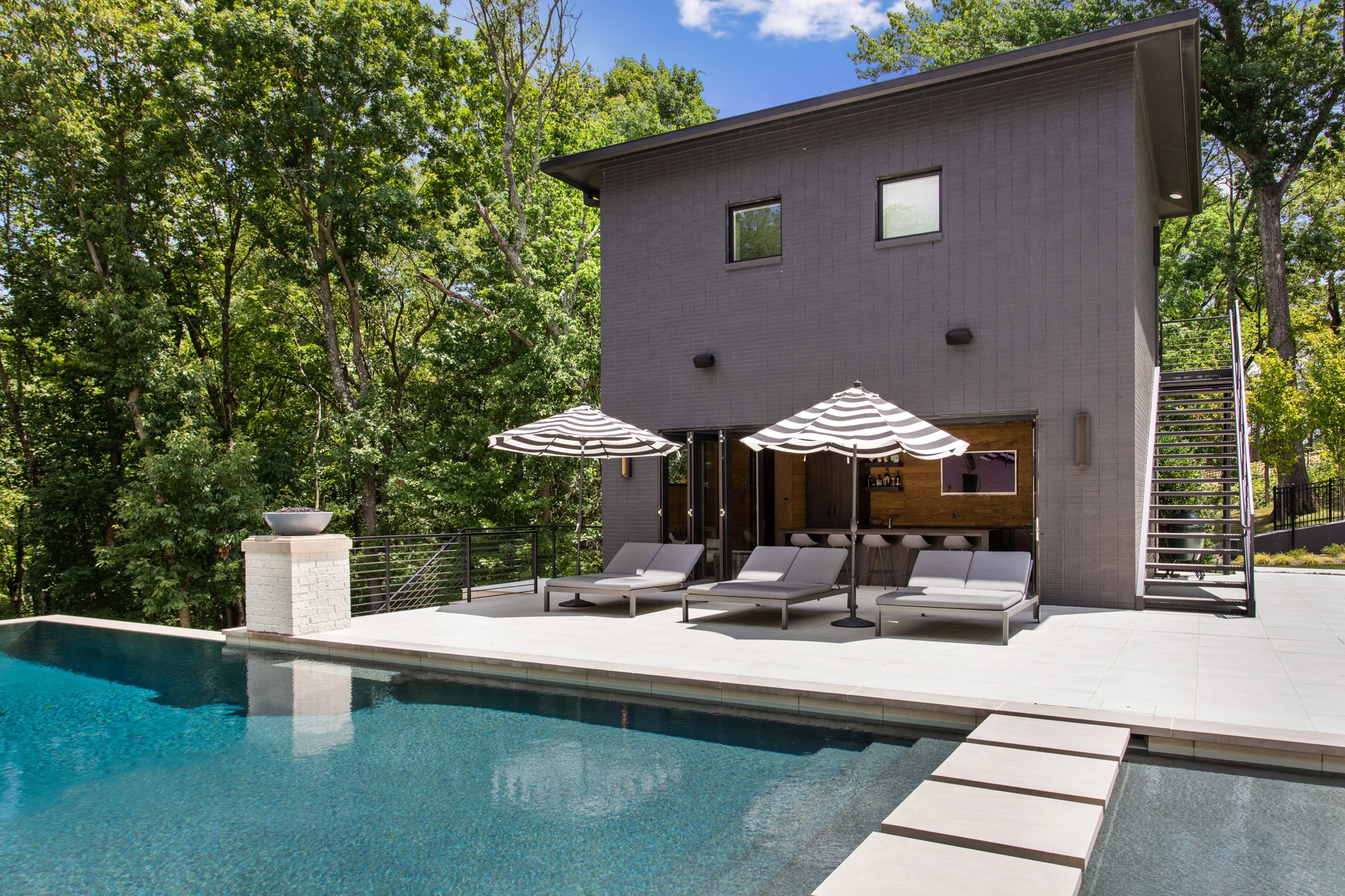 960 Overton Lea Road Nashville, TN 37220 - Photo 42 of 50 a view of a house with pool porch and chairs