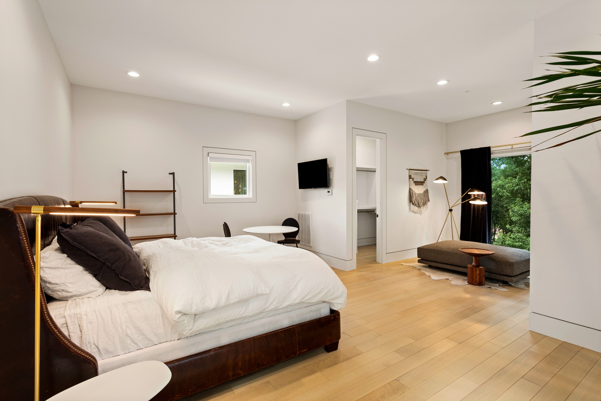 960 Overton Lea Road Nashville, TN 37220 - Photo 46 of 50 a bedroom with a bed and gym equipment