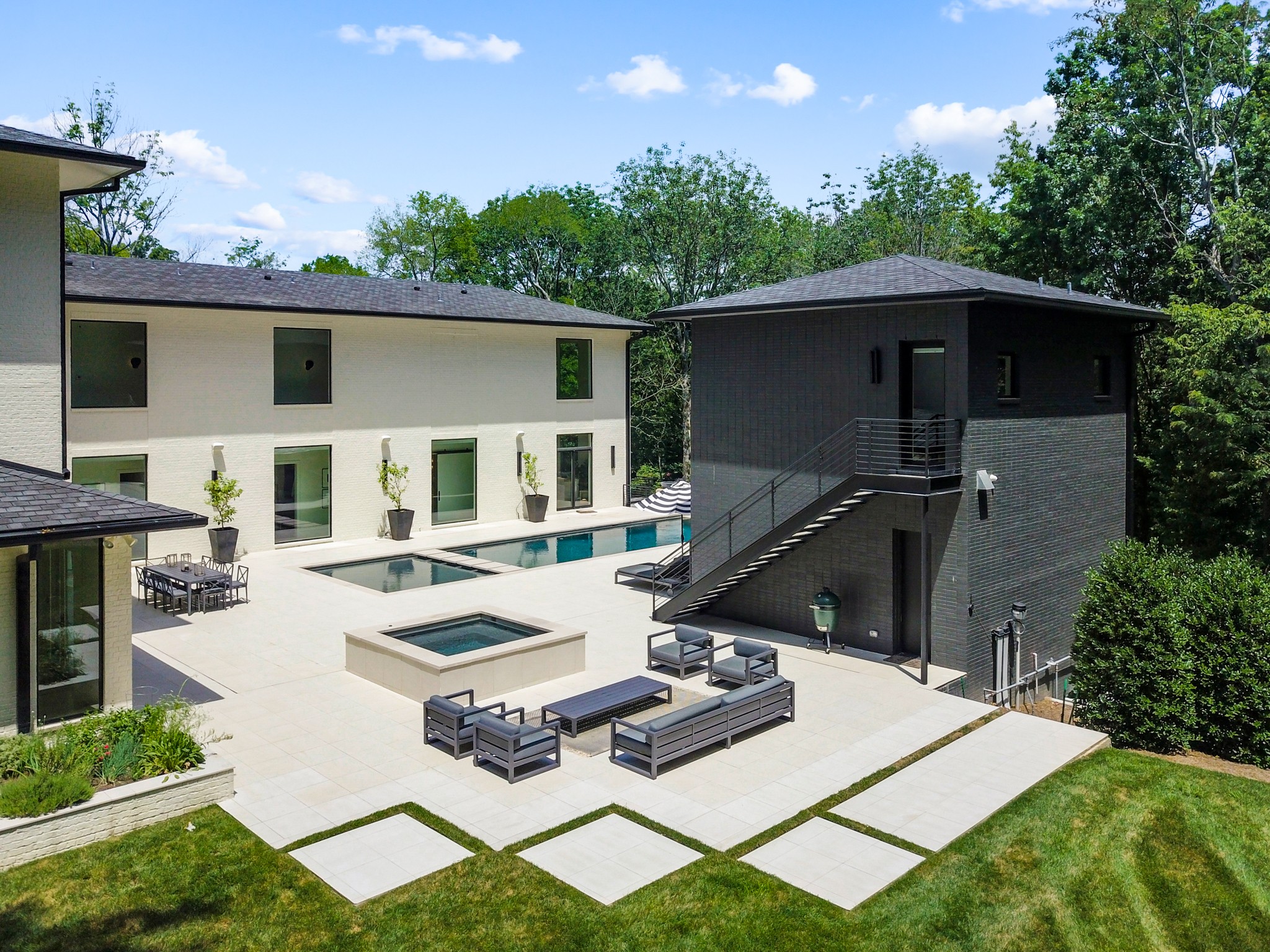 960 Overton Lea Road Nashville, TN 37220 - Photo 49 of 50 a view of house with backyard porch and furniture