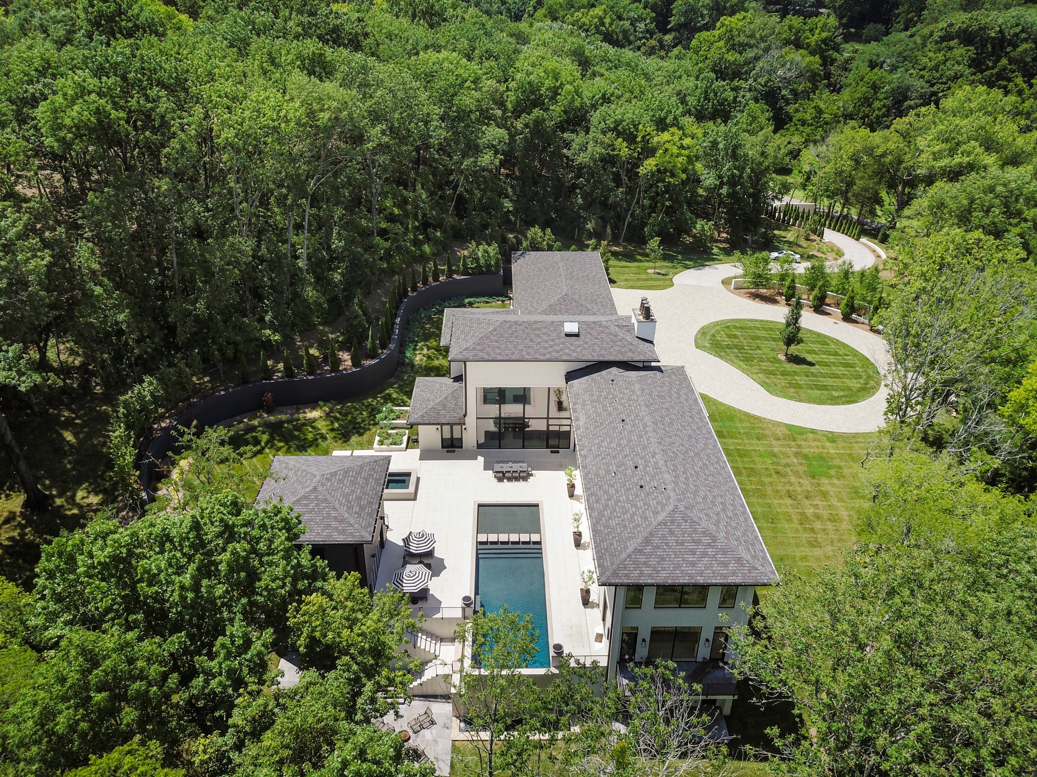 960 Overton Lea Road Nashville, TN 37220 - Photo 50 of 50 an aerial view of a house with a garden